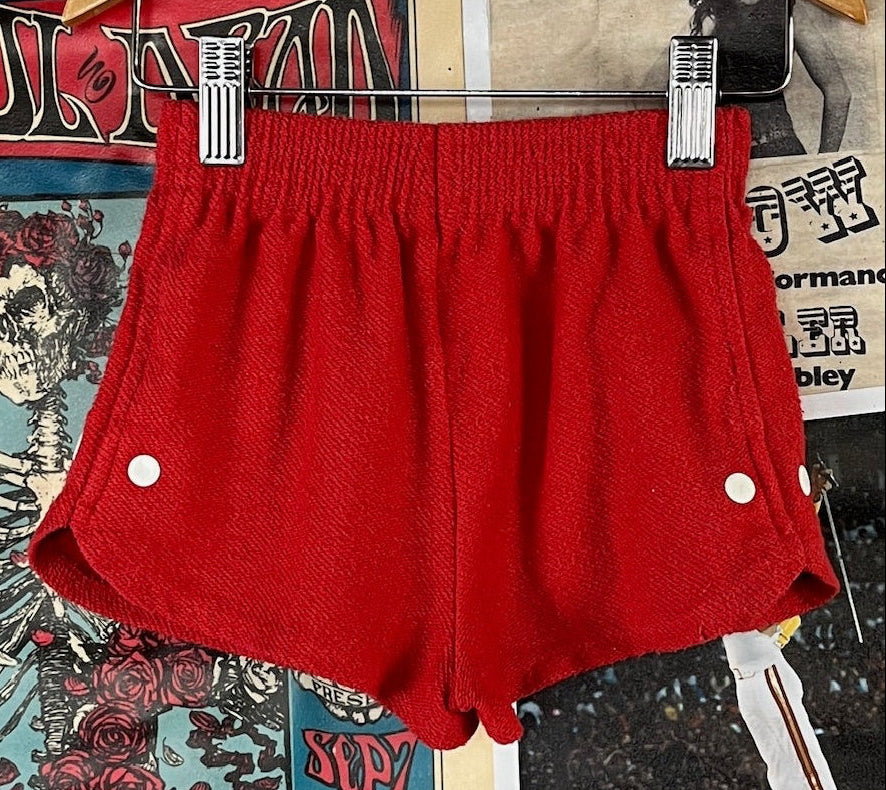 Red elastic kids vintage 90s Christian Dior shorts.