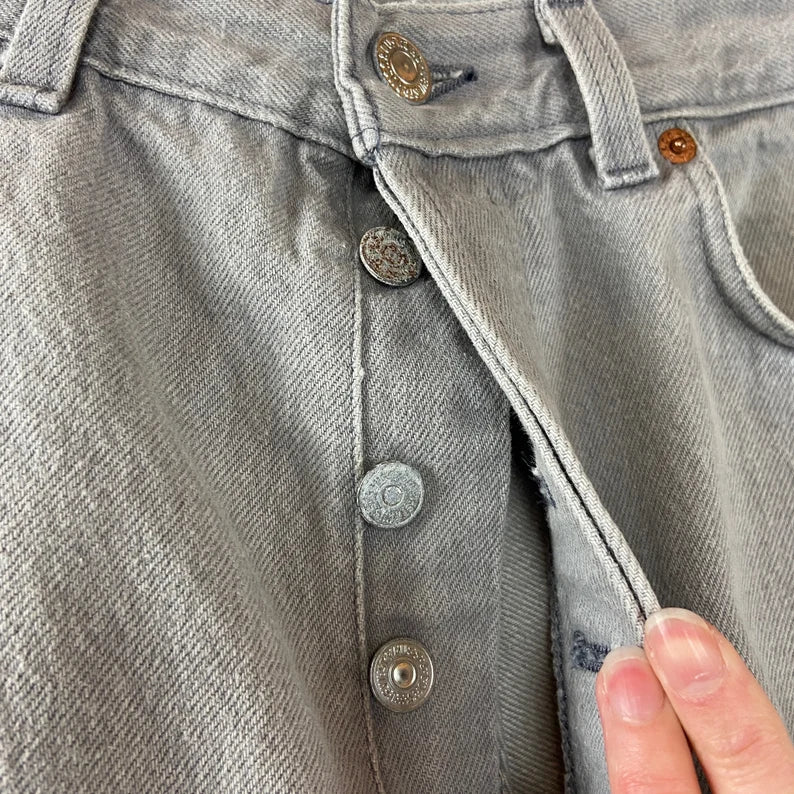 Vintage 80s Gray Stained Faded Levis 501 Button Fly Made in USA Denim Jeans 32x33
