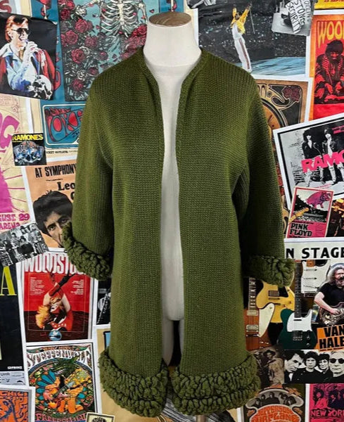 Vintage women's 60s green wool knit cardigan sweater XS mod retro fashion.